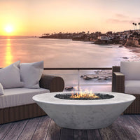 Embarcadero 60 round concrete fire pit table by Prism Hardscapes with custom patina finish and propane fuel options