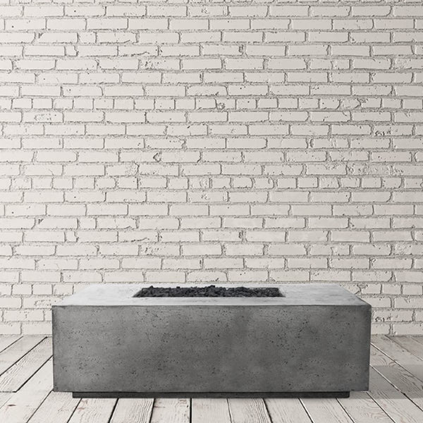 Porto 68 round concrete fire pit table with custom patina finish by Prism Hardscapes
