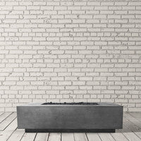 Tavola VIII rectangle concrete fire pit table with custom patina finish by Prism Hardscapes