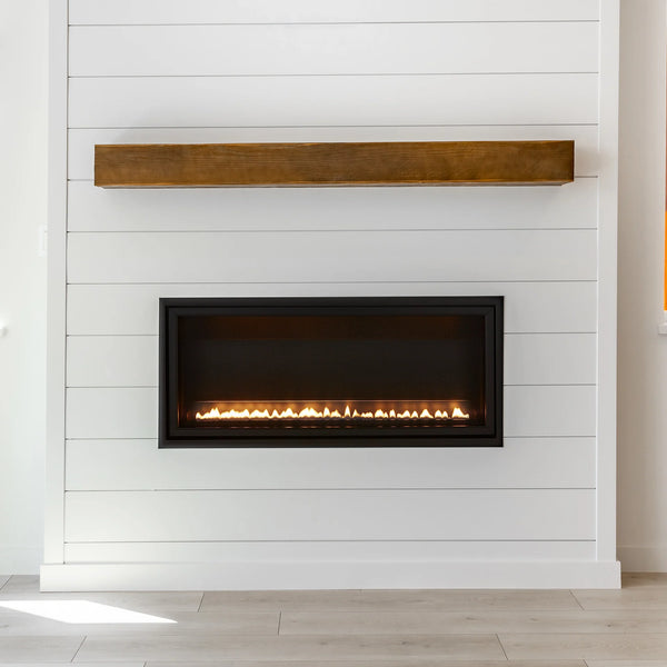 Empire Boulevard SL 30 inch vent-free gas fireplace recessed in wall with linear flame and black frame