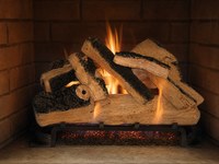 24" Western Pine Vented Gas Log Set | Hargrove — lit with warm flame