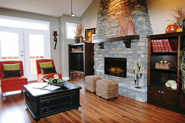 Dimplex 26" Multi-Fire XHD electric firebox with glowing logs and customizable flame effects in sleek black glass surround