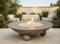 American Fyre Designs Versailles 54-Inch Round GFRC Gas Fire Table with Ball Feet — outdoor setting