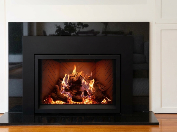 Empire Rainier 34" Direct Vent Gas Fireplace Insert - Model DVCP34 — room setting. AI-assisted visualization; shown fronts, liners, media and surroundings may be optional.