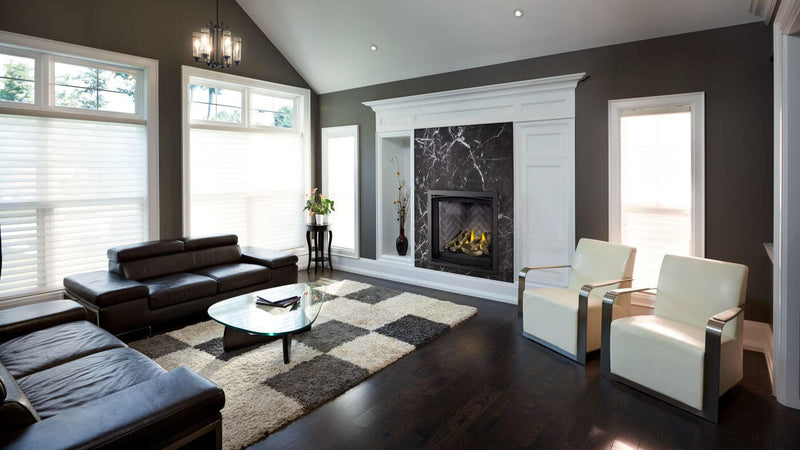 Napoleon Altitude X 36 gas fireplace lifestyle angle shot with driftwood media