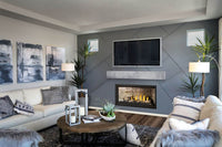 Napoleon Ascent Linear Premium 42 gas fireplace lifestyle shot with driftwood logs and lava rocks