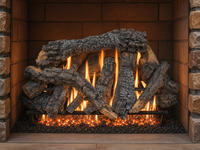 36" Canyon Timbers Vented Gas Log Set | Hargrove — lit with warm flame