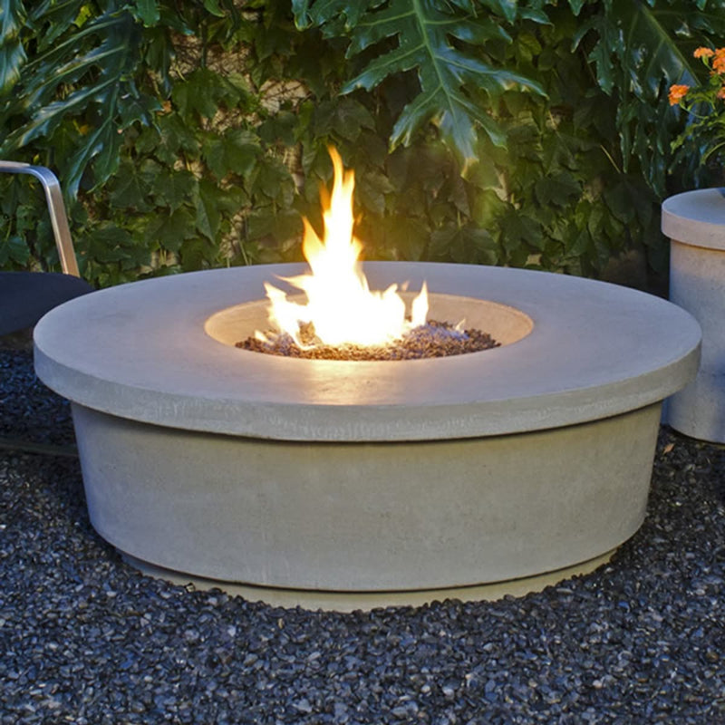 Contempo 47-inch round concrete fire pit table by American Fyre Designs outdoors
