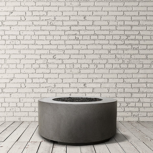 Cilindro Gas Fire Table round concrete fire pit by Prism Hardscapes with custom patina finish