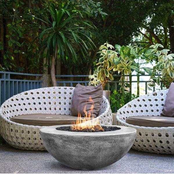 Moderno V round concrete fire pit table with customizable fuel and glass options by Prism Hardscapes