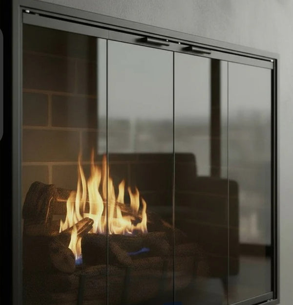 Stiletto Regular / Opening 33 W x 18 1/2” / Inside Fit / Masonry Type / Matte Black / Square Handles / Tinted Grey Glass
Bi-Fold Doors/  Draft Control