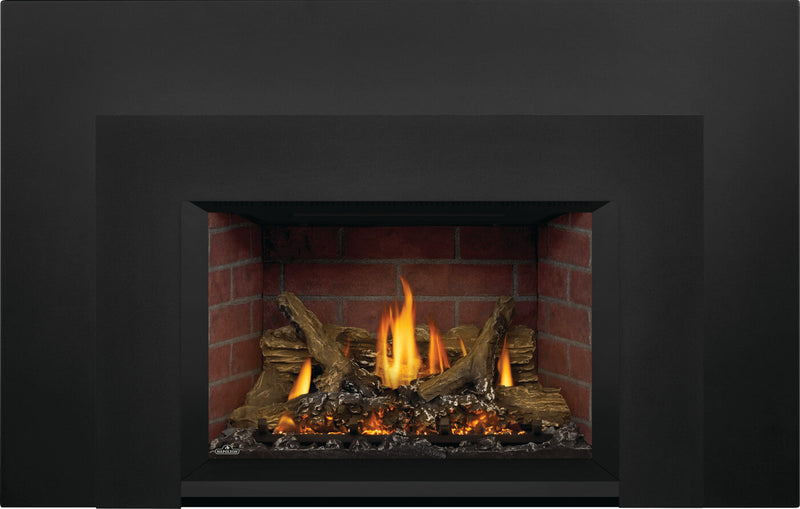 Napoleon Oakville X3 gas fireplace insert product shot with black large faceplate and old town brick panels