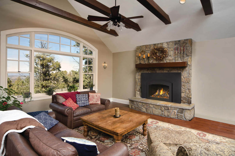 Napoleon Oakville X3 gas insert lifestyle shot in living room with stone surround