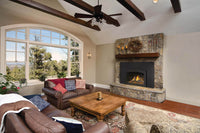Napoleon Oakville X3 gas insert lifestyle shot in living room with stone surround