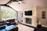 Napoleon Oakville X4 gas insert lifestyle shot with mantel and TV above