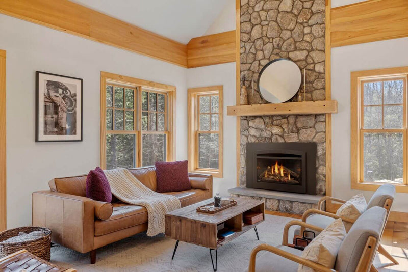 Napoleon Rosedale 3 gas insert lifestyle angle shot with MIRRO-FLAME panels and oak logs