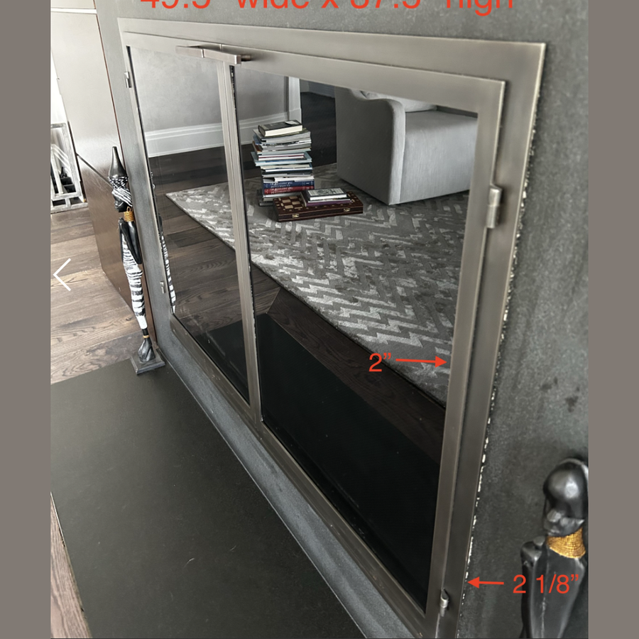 Carolina Fireplace Doors + Vertical Styles / Overall size: 49.5" wide x 37.5" high / frame  2 1/8" wide / door frame doors: 2" / Natural Iron / Black Glass / Square Handle / Cabinet Doors