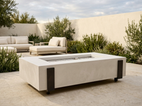 American Fyre Designs Iron Saddle 60" Rectangular GFRC Gas Fire Table — outdoor setting