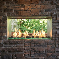 ODLANAIGST-48 — Lanai48ST see-through outdoor linear fireplace with original open opposite side. Depicted accessories are optional; no claim that every option is included. AI-assisted editorial visualization preserving the manufacturer-photographed installation. Installation must follow the actual supplied manual.