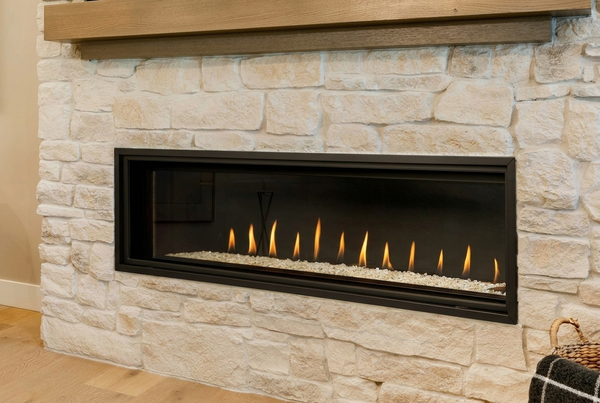 Montigo Delray 60" Direct Vent Linear Gas Fireplace - Model Delray 60 — room setting. AI-assisted visualization; shown fronts, liners, media and surroundings may be optional.
