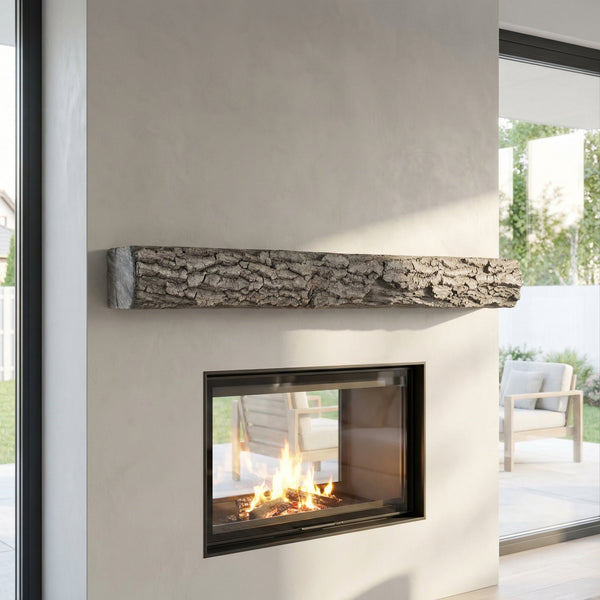 Half round non-combustible concrete mantel shelf with weathered grey finish and rockface stone look