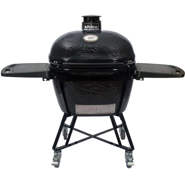 Primo All-In-One Oval XL ceramic kamado grill with cradle, side shelves, and stainless steel grates