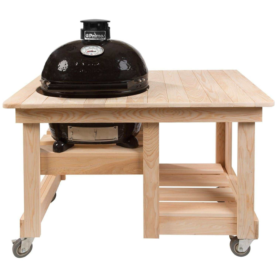 Primo Oval Junior 200 Ceramic Kamado Grill On Countertop Cypress Table With Stainless Steel Grates