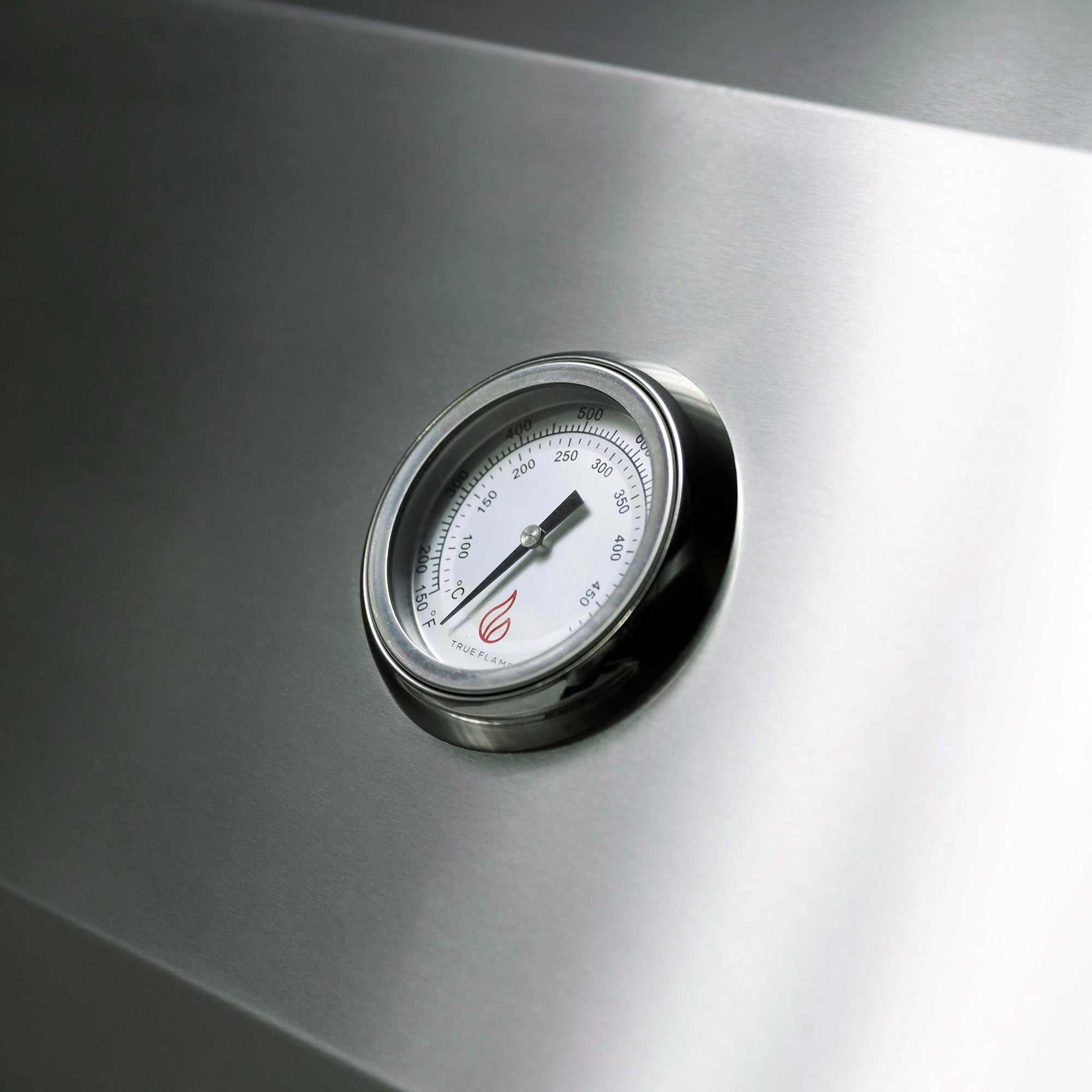 Close-up of stainless steel temperature gauge on TrueFlame 40 Inch Built-In Grill
