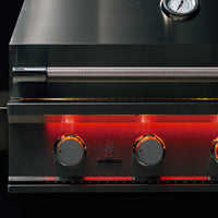 Close-up of TrueFlame 40 Inch Built-In Grill stainless steel control panel with illuminated knobs and temperature gauge