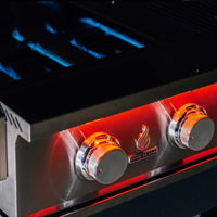 Close-up of TrueFlame 40 Inch Built-In Grill control knobs with blue burner flames and red LED lighting