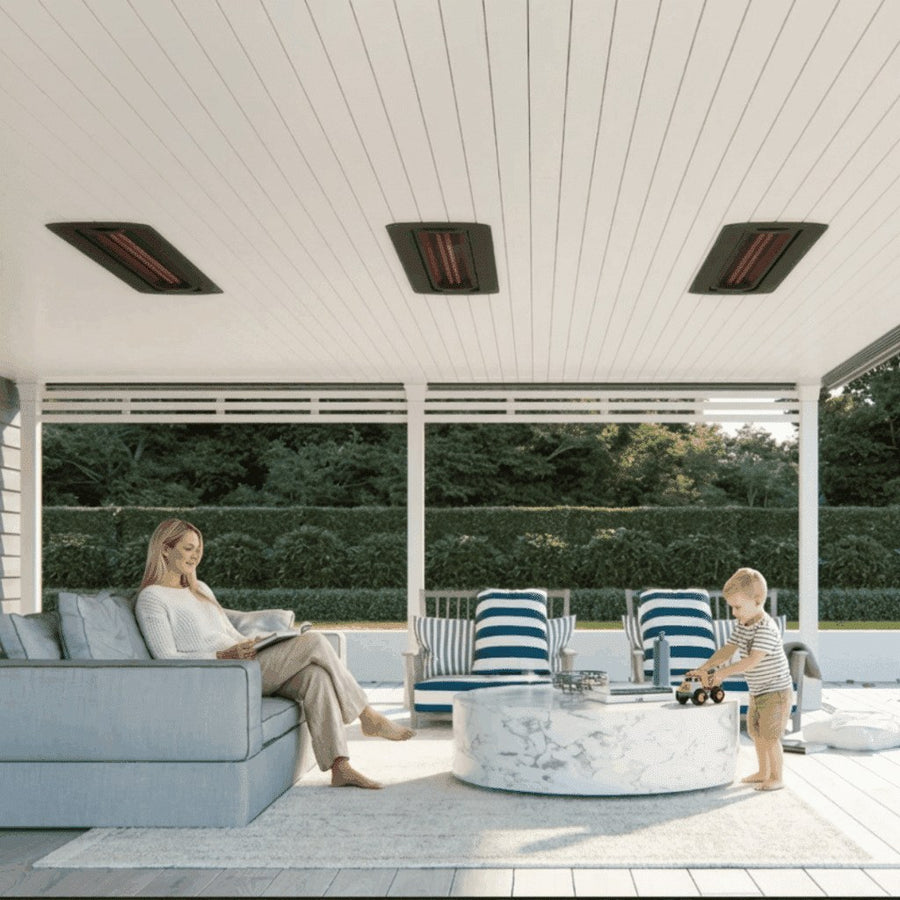 Tungsten heaters installed above a bright outdoor family lounge