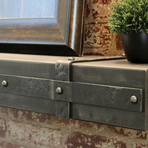 Close-up of Stoll Aged Iron decorative mantel banding