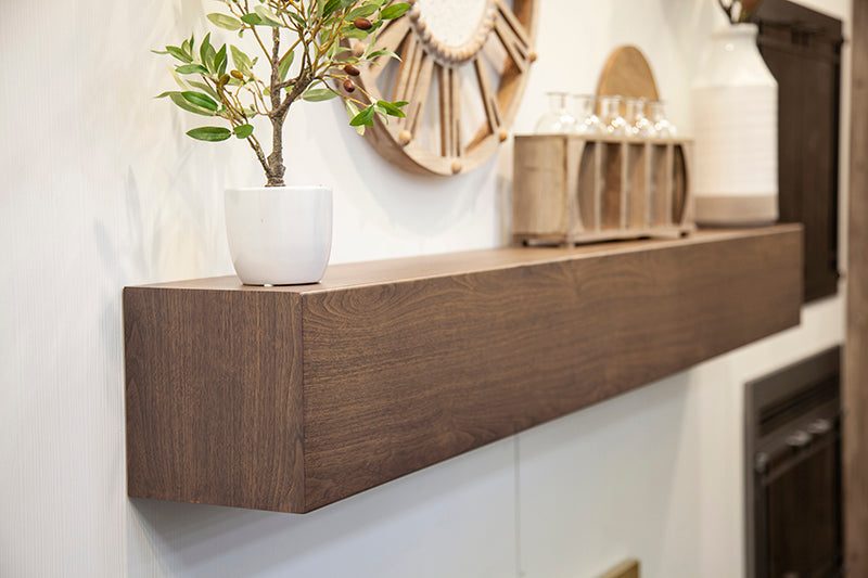 Stoll woodgrain metal mantel showing a timber-like surface and edge