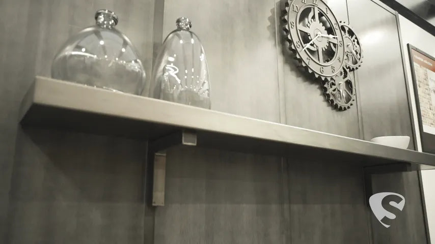 Play the 18-second film of custom steel mantel shelves